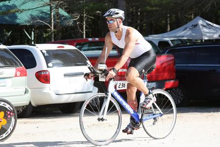 Start of the bike leg on a sandy road